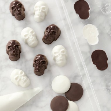 Mini skulls mold for chocolate and candy melts 24 cavity Wilton