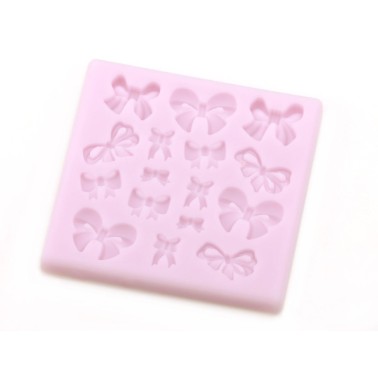 Stampo in silicone fiocchetti piccoli -  in vendita su Sugarmania.it